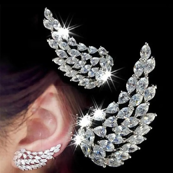 Swarovski Jewelry - Angel wings earrings with climbers in Swarovski